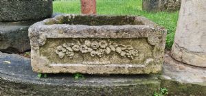 Stone basin with frieze.